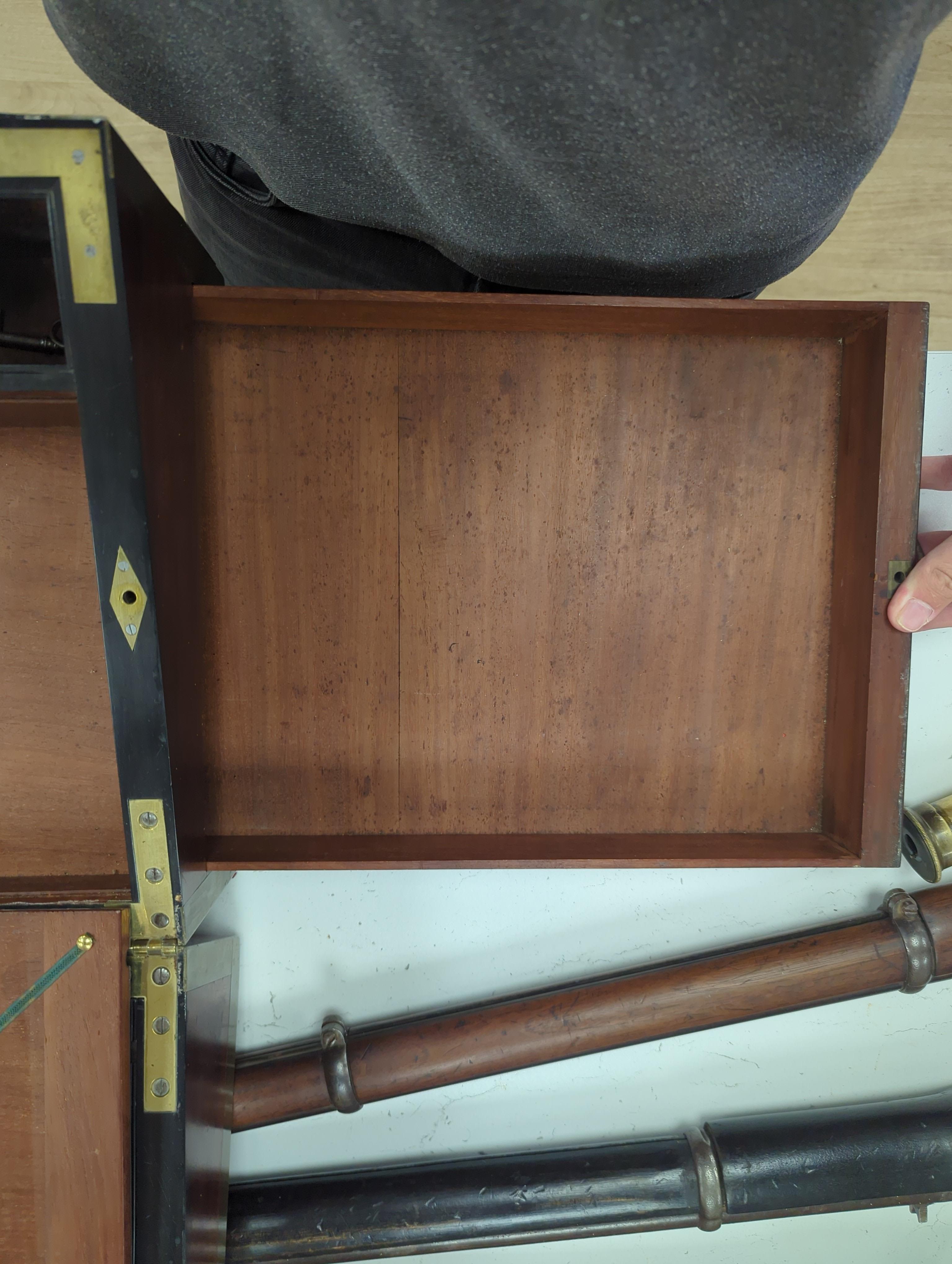 A George III mahogany, ebony and brass-mounted ship's writing box by Wells & Co., screw fixings to each side with original key, 50.5cm x 30cm x 19.5cm
